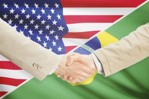 Businessmen shaking hands - United States and Brazil